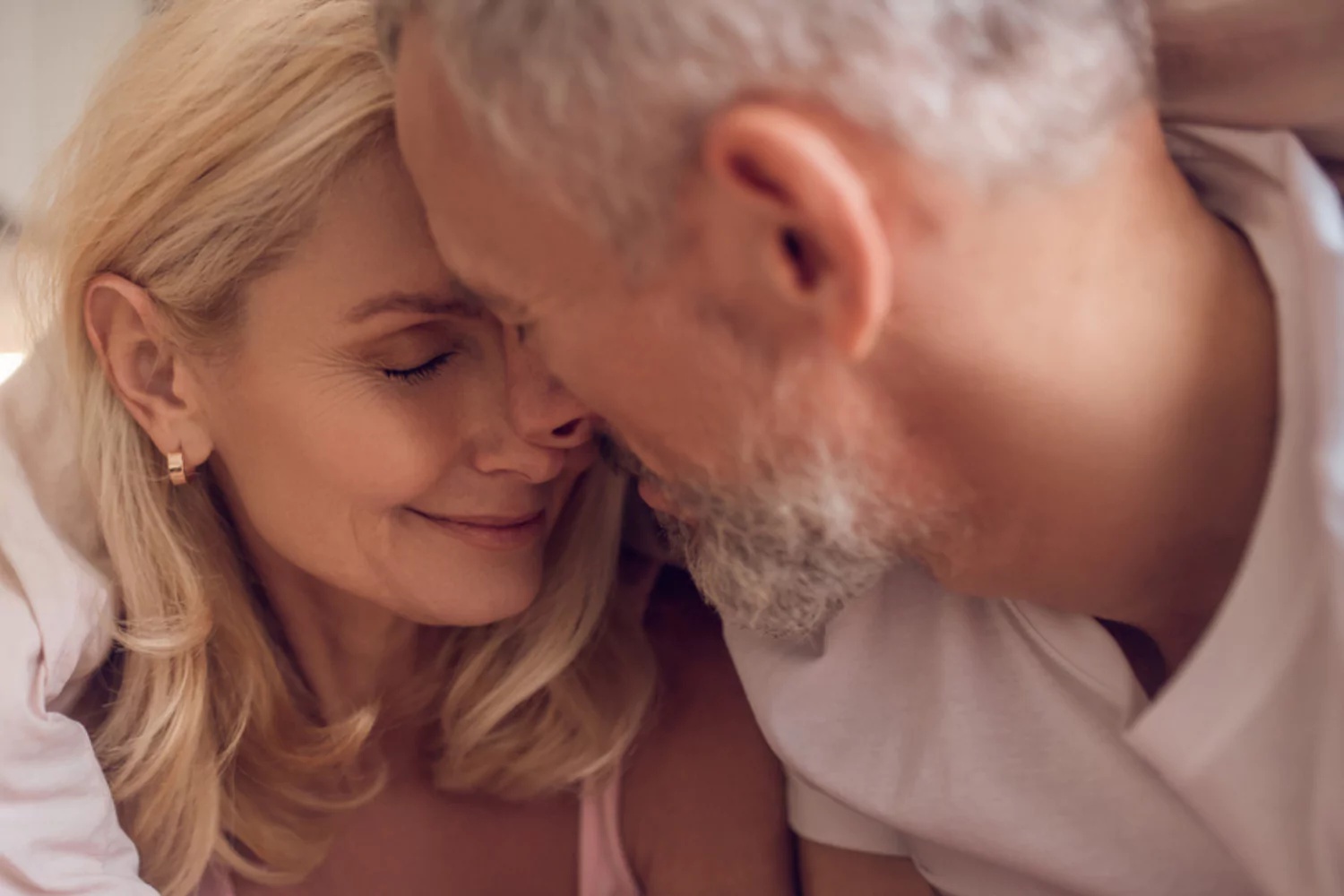 Confident happy couple enjoying intimacy