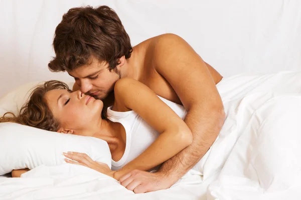 Confident happy couple enjoying intimacy